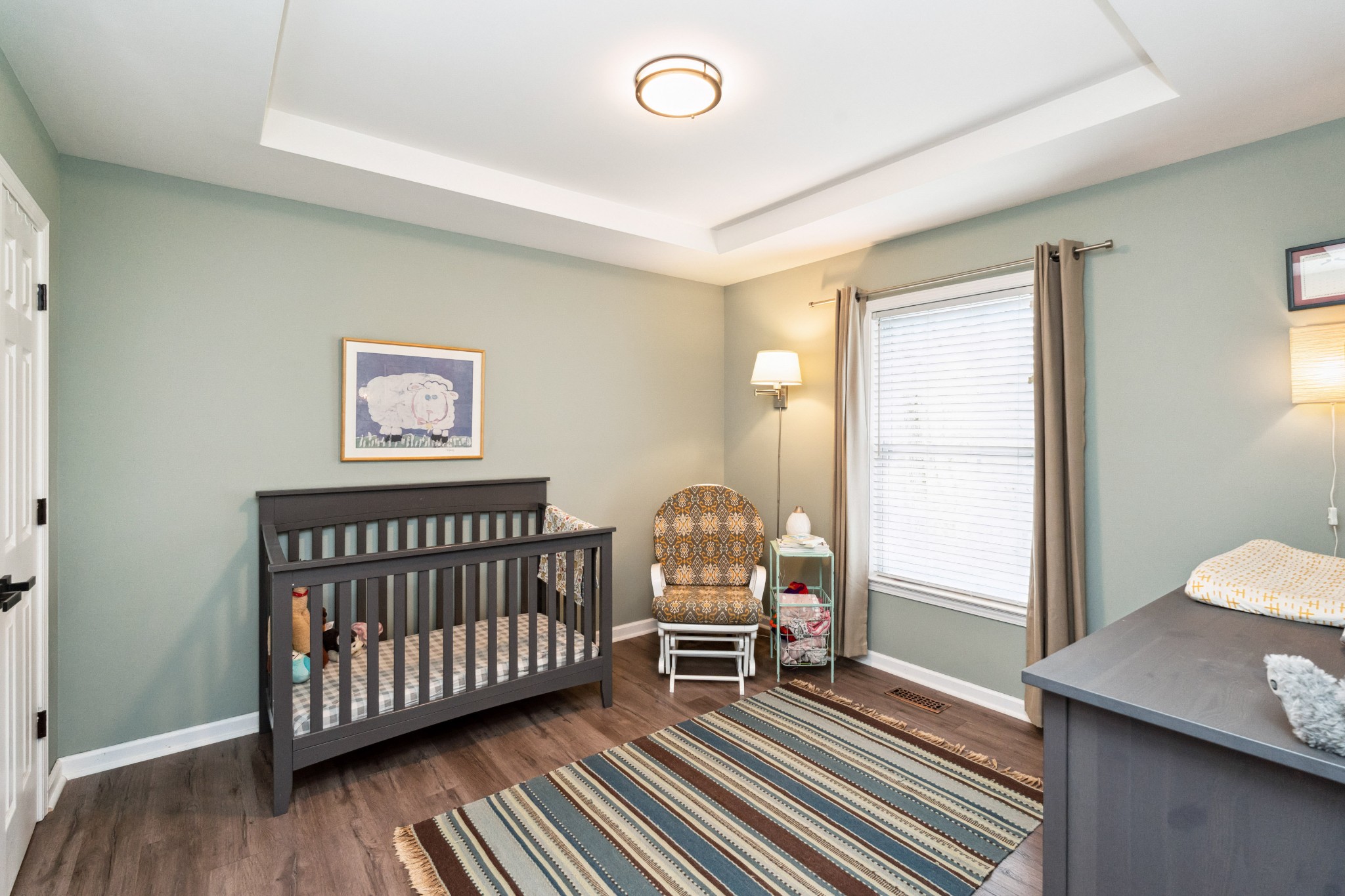 7375 Sac Lampley Road Bon Aqua, TN 37025 - Photo 12 of 29 a bedroom with furniture and a window