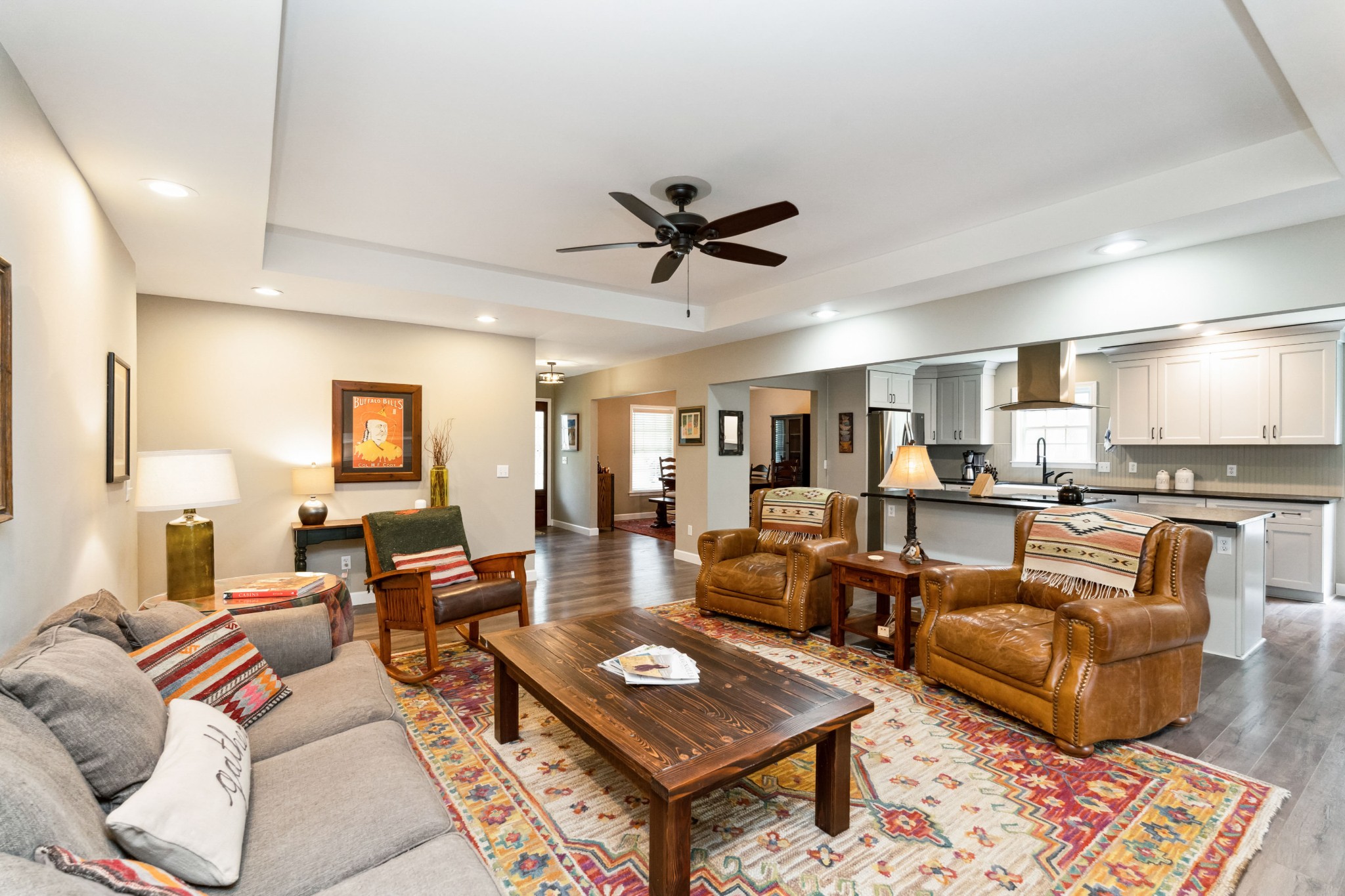 7375 Sac Lampley Road Bon Aqua, TN 37025 - Photo 6 of 29 a living room with furniture a rug and a kitchen view