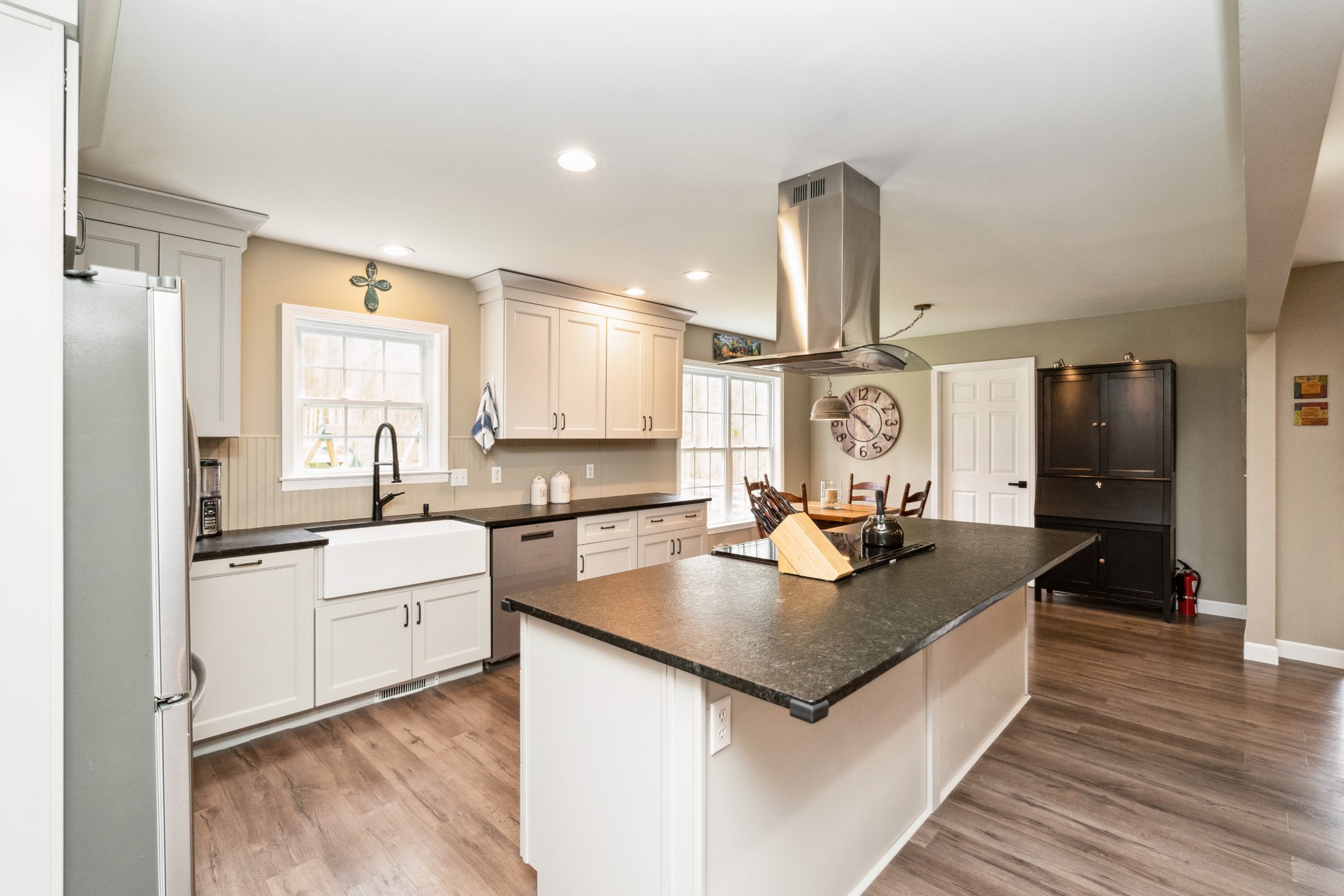 7375 Sac Lampley Road Bon Aqua, TN 37025 - Photo 8 of 29 a kitchen with stainless steel appliances granite countertop a sink stove and refrigerator