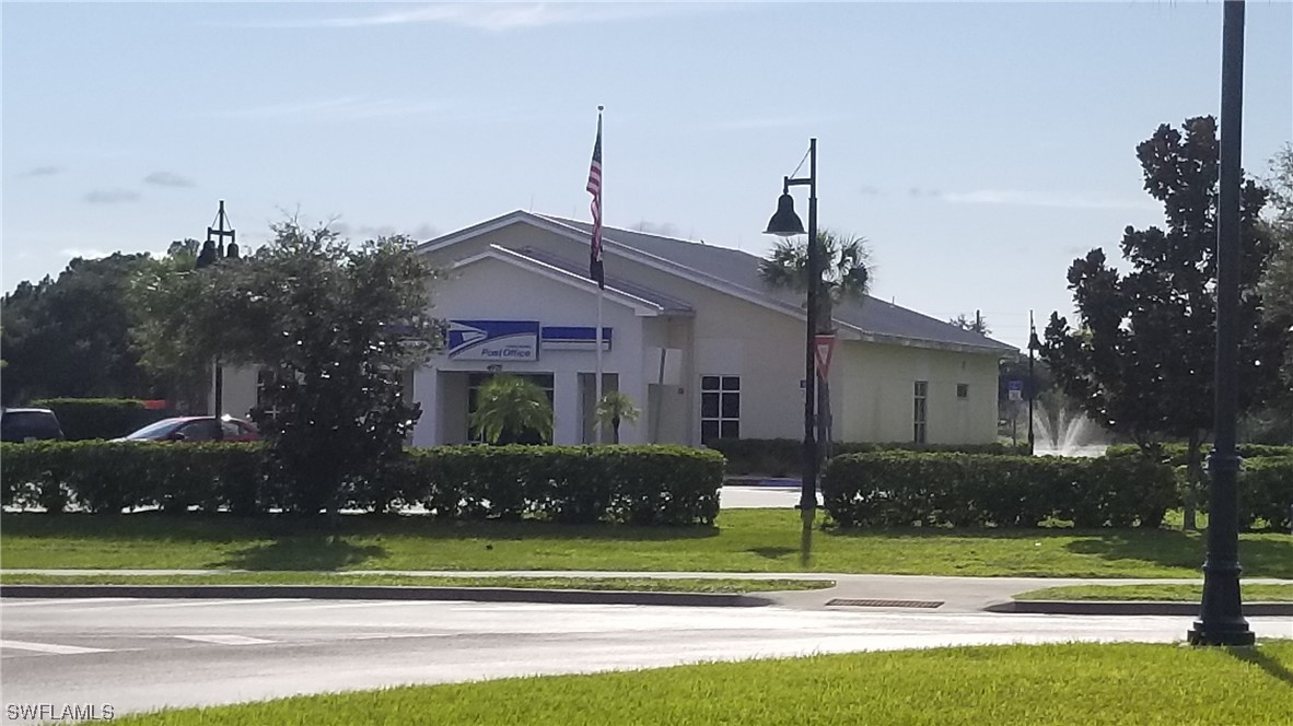 954126511 Trolley Rd Port North Port, FL 34291 - Photo 16 of 43 a front view of a house with a yard