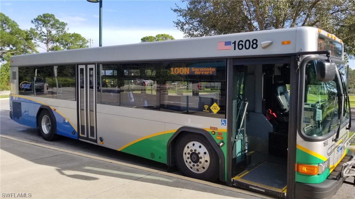 954126511 Trolley Rd Port North Port, FL 34291 - Photo 27 of 43 a view of a car park with porch