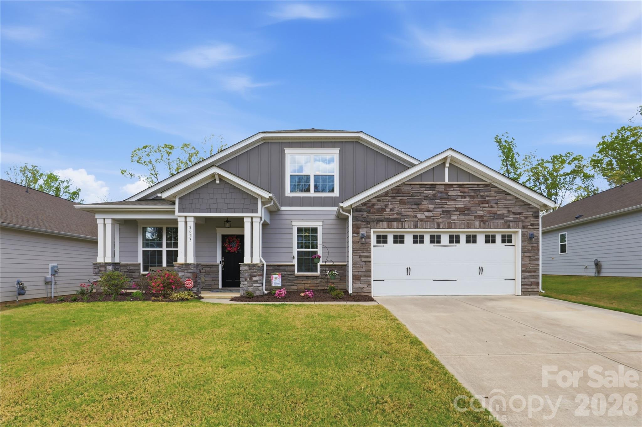 3023 Eagle Ridge Lane Indian Trail, NC 28079 - Photo 2 of 47 a view of a house with a yard