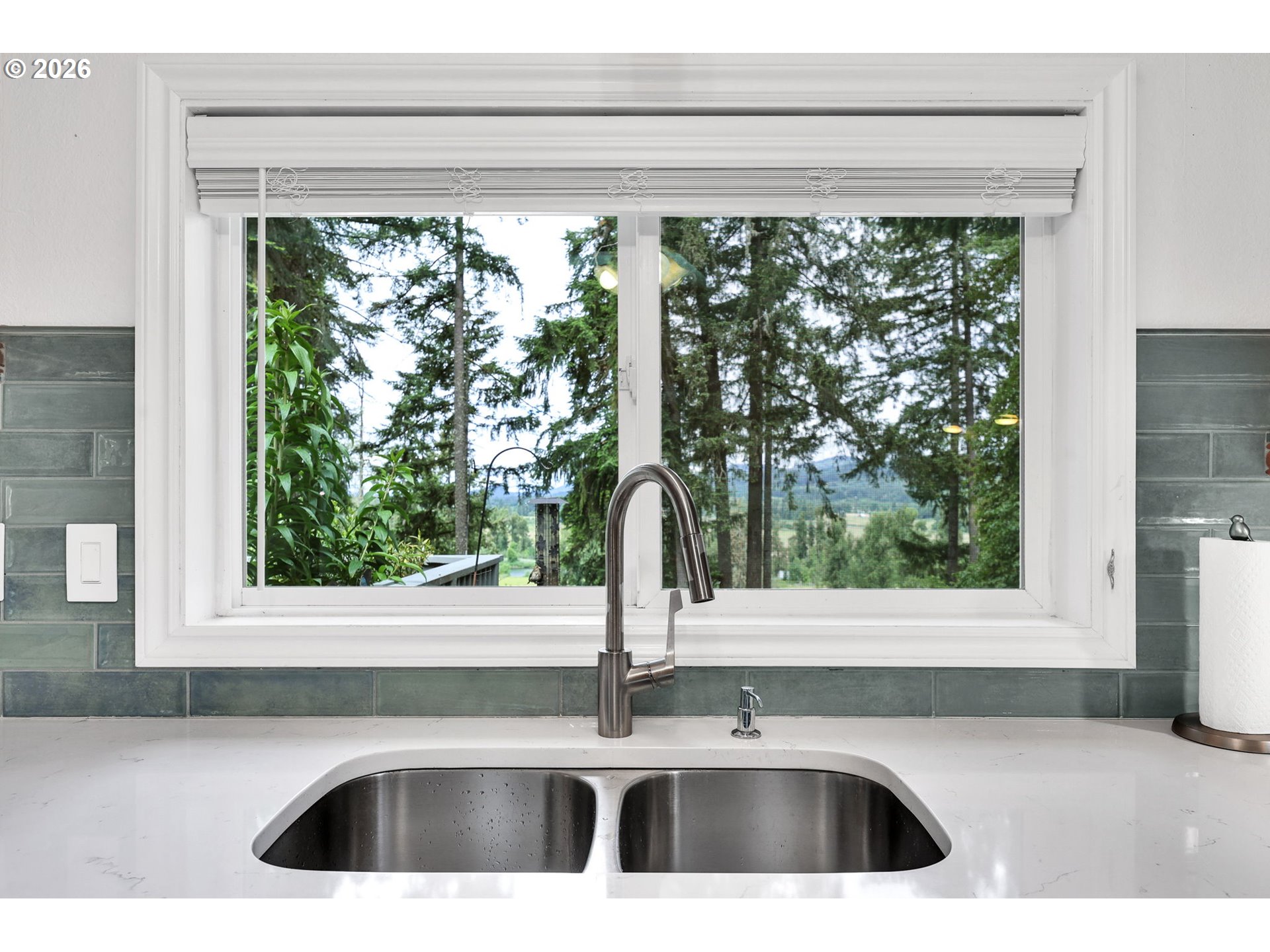 88108 Tiki Lane Springfield, OR 97478 - Photo 18 of 48 a kitchen sink sitting next to a window