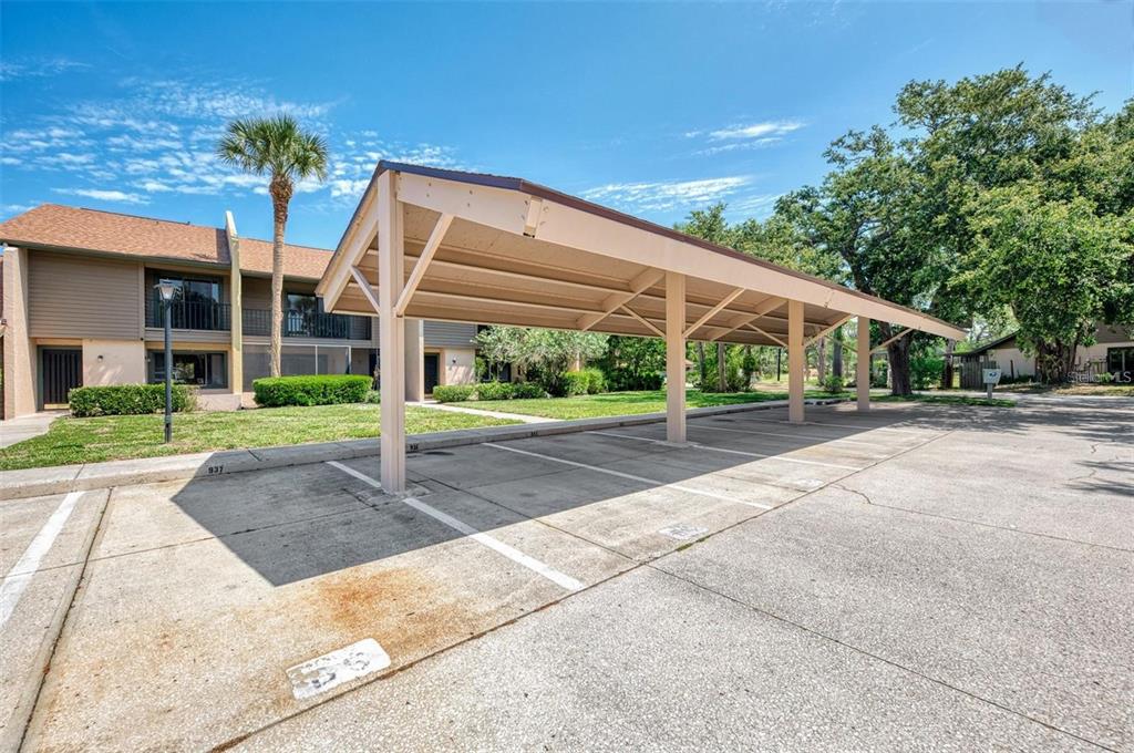 935 Sunridge Way, Unit B4 Sarasota, FL 34234 - Photo 41 of 45 a view of a house with a street