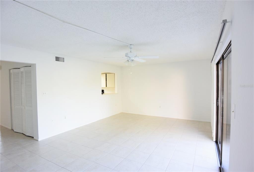 935 Sunridge Way, Unit B4 Sarasota, FL 34234 - Photo 8 of 45 wooden floor in an empty room