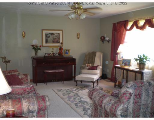 Living Room. This inviting living room speaks for itself.  It is perfectly accessorized and tastefully decorated.  A true representation of the quality and beauty of the entire home.