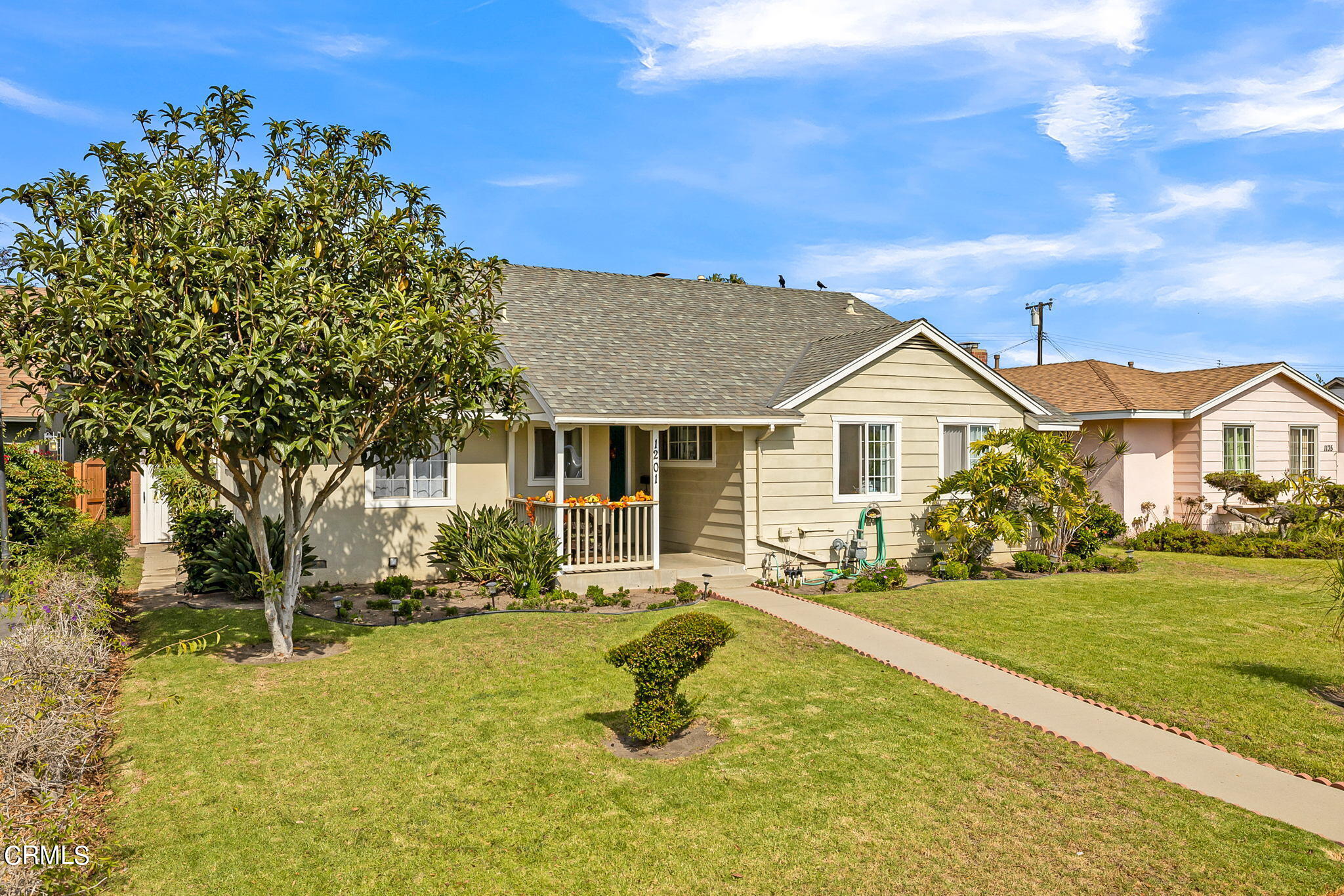 1201 West Roderick Avenue Oxnard, CA 93030 - Photo 2 of 32 a view of a house with swimming pool and sitting area