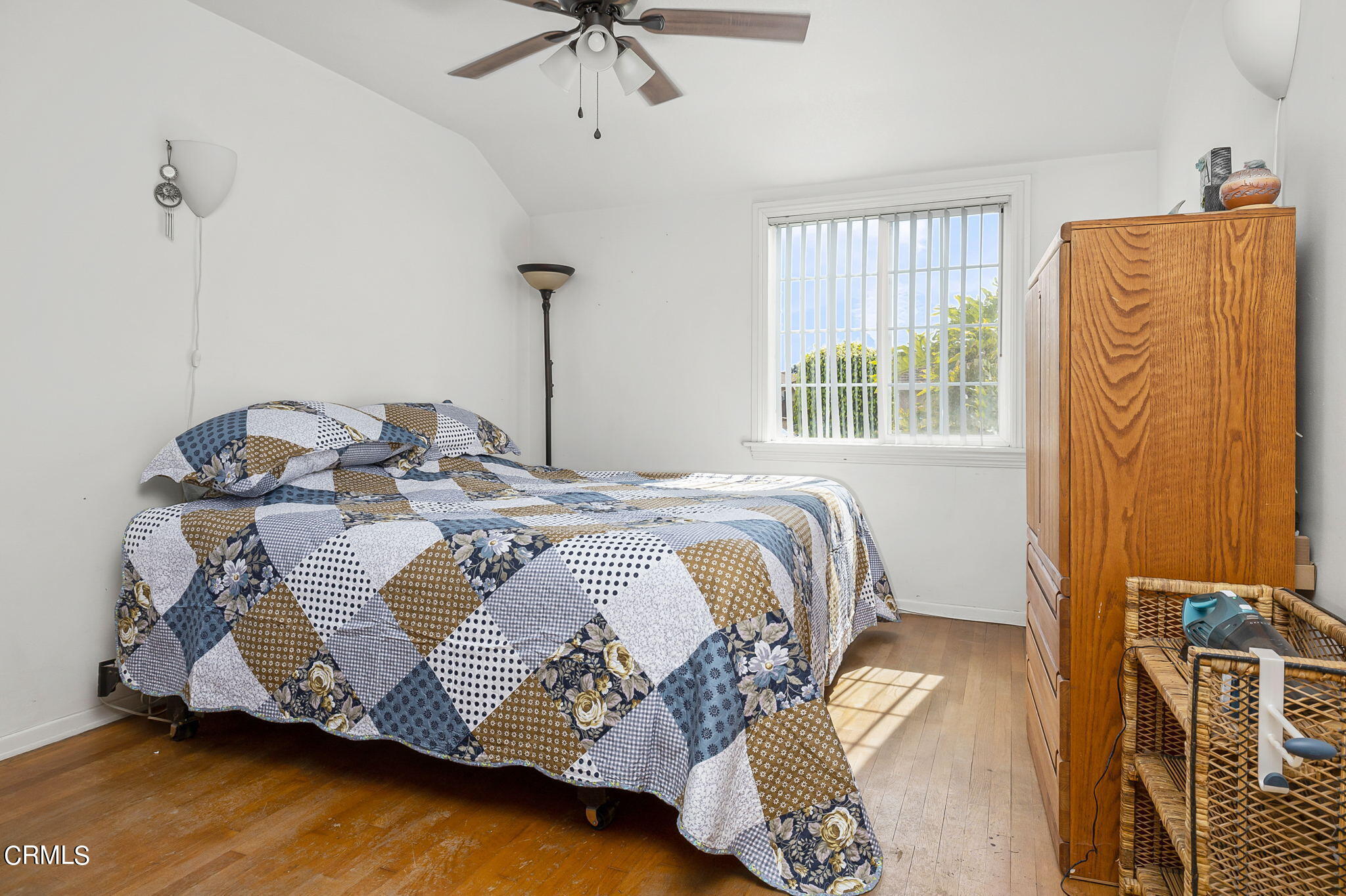 1201 West Roderick Avenue Oxnard, CA 93030 - Photo 20 of 32 a bedroom with a bed and a window