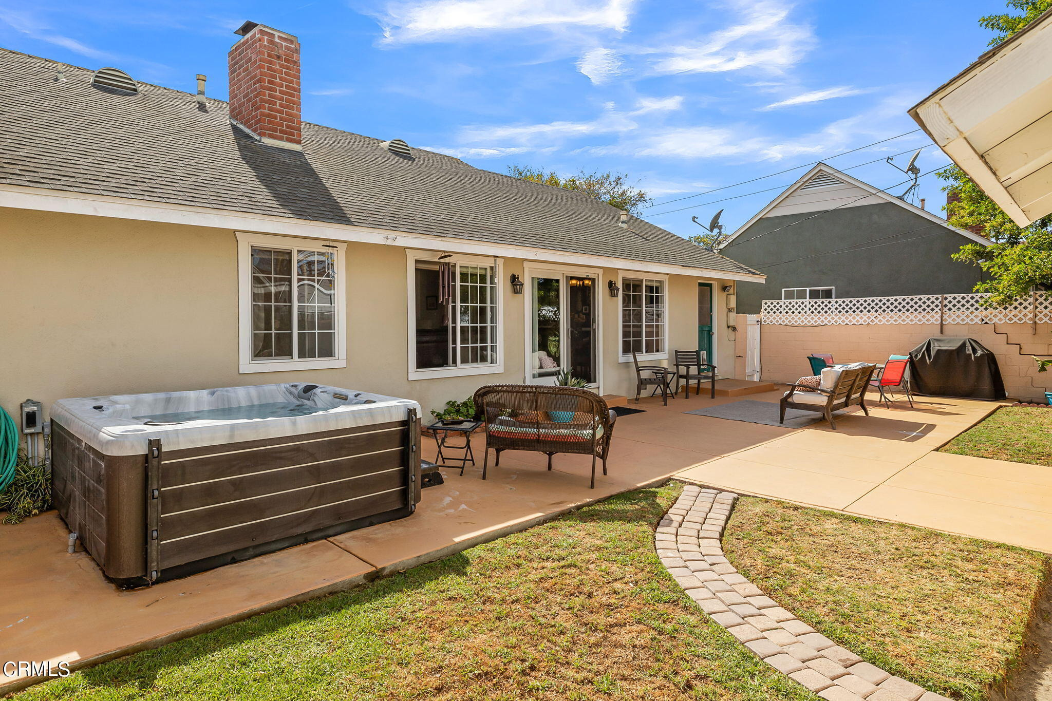 1201 West Roderick Avenue Oxnard, CA 93030 - Photo 27 of 32 a view of a house with pool and chairs