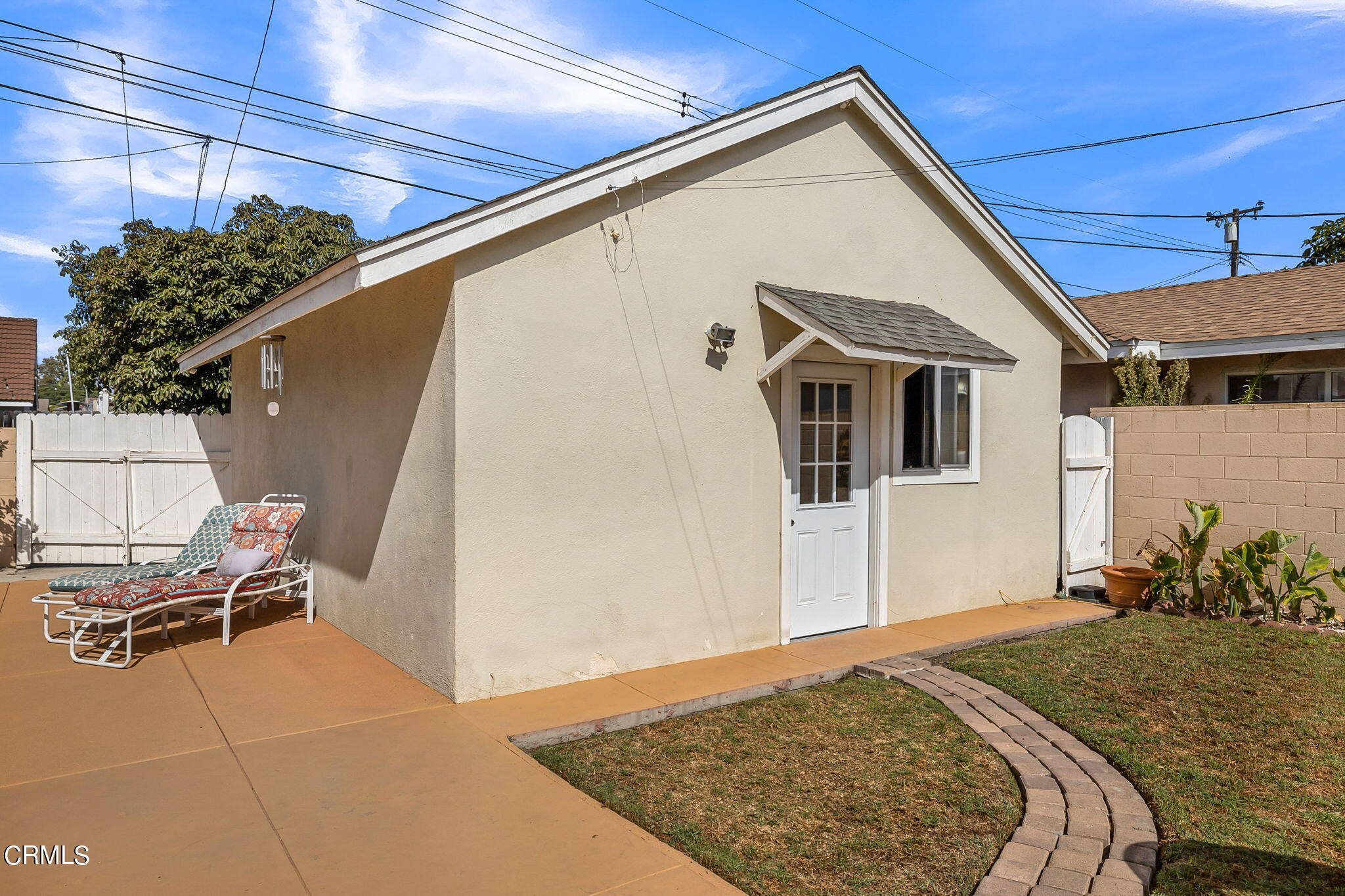 1201 West Roderick Avenue Oxnard, CA 93030 - Photo 31 of 32 a view of a house with a backyard