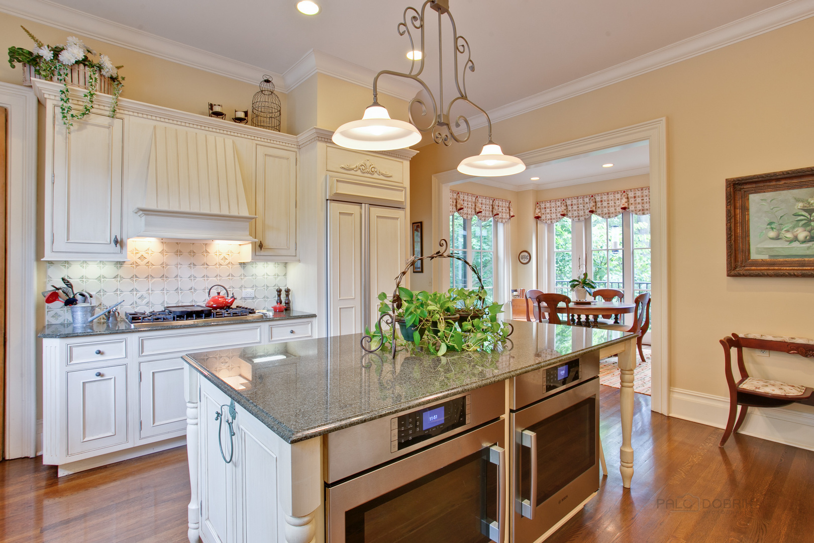 644 East Deerpath Road Lake Forest, IL 60045 - Photo 22 of 48 a kitchen with a table and chairs in it
