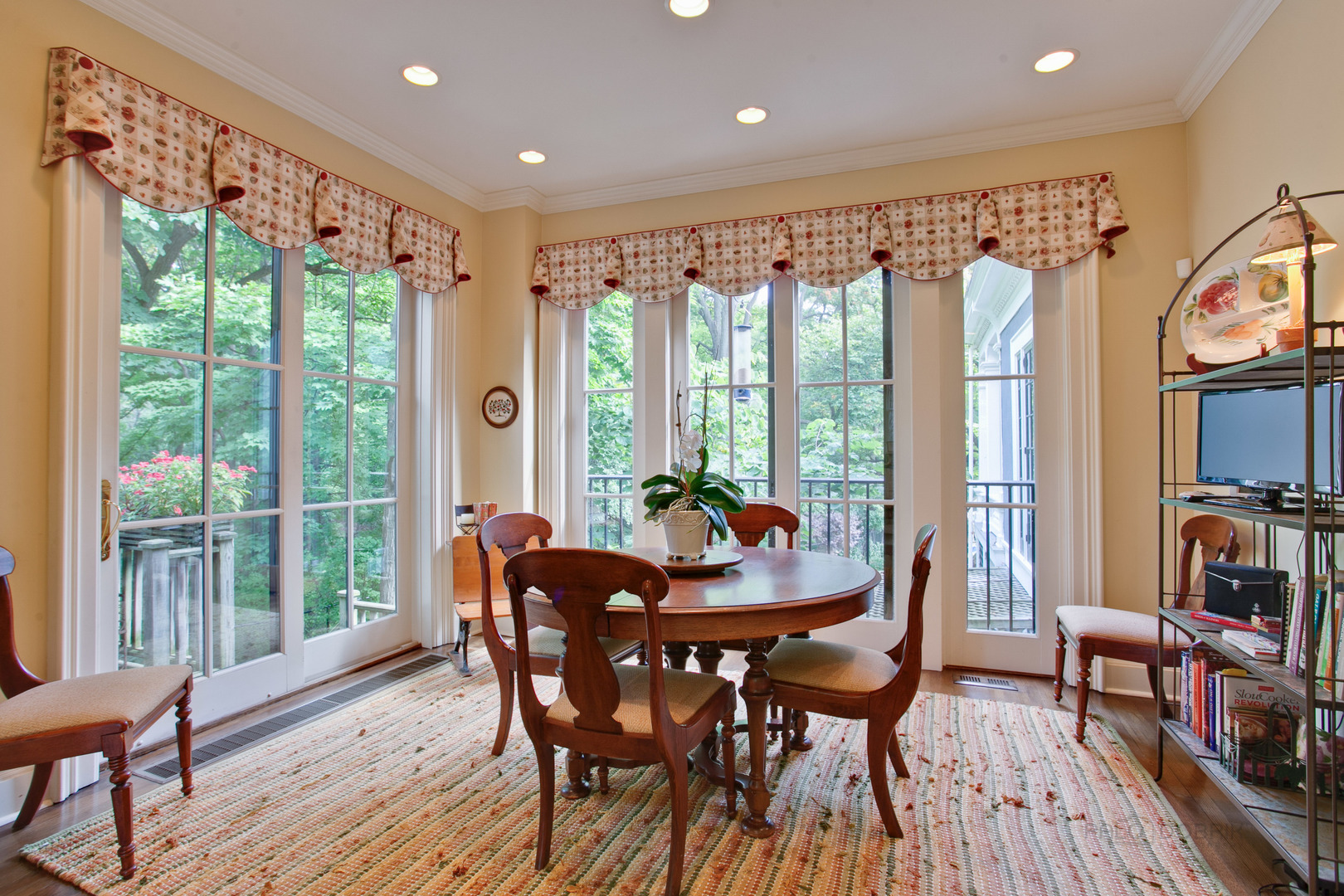 644 East Deerpath Road Lake Forest, IL 60045 - Photo 23 of 48 a dining room with furniture and a floor to ceiling window