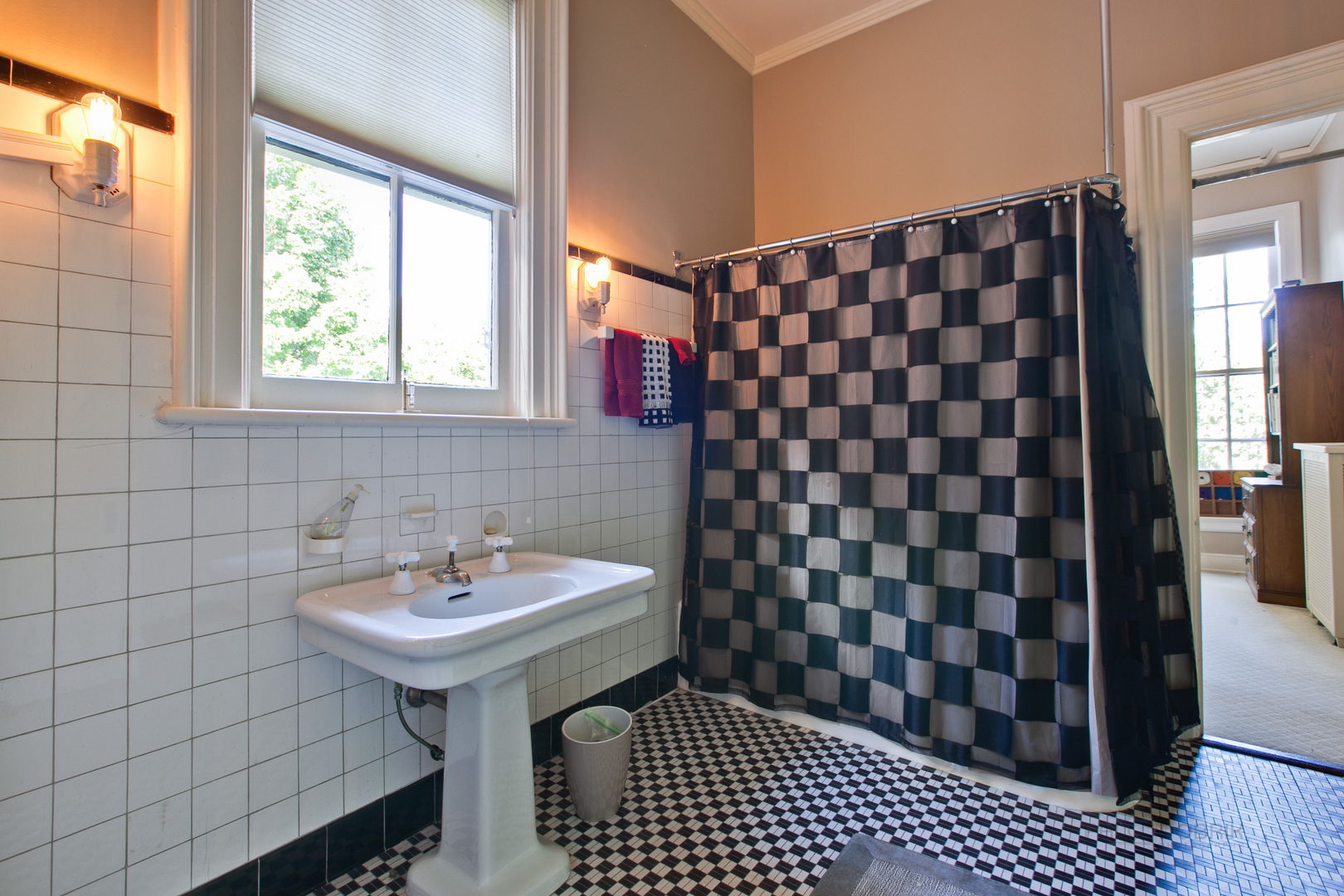 644 East Deerpath Road Lake Forest, IL 60045 - Photo 33 of 48 a bathroom with a sink a mirror and a shower