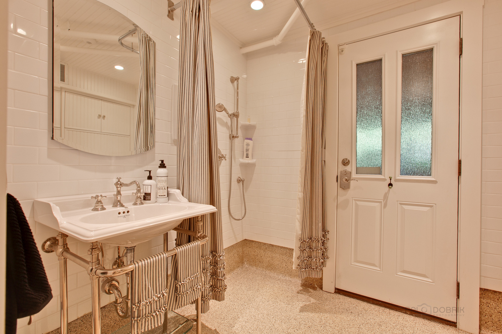 644 East Deerpath Road Lake Forest, IL 60045 - Photo 39 of 48 a spacious bathroom with a sink a mirror and a shower
