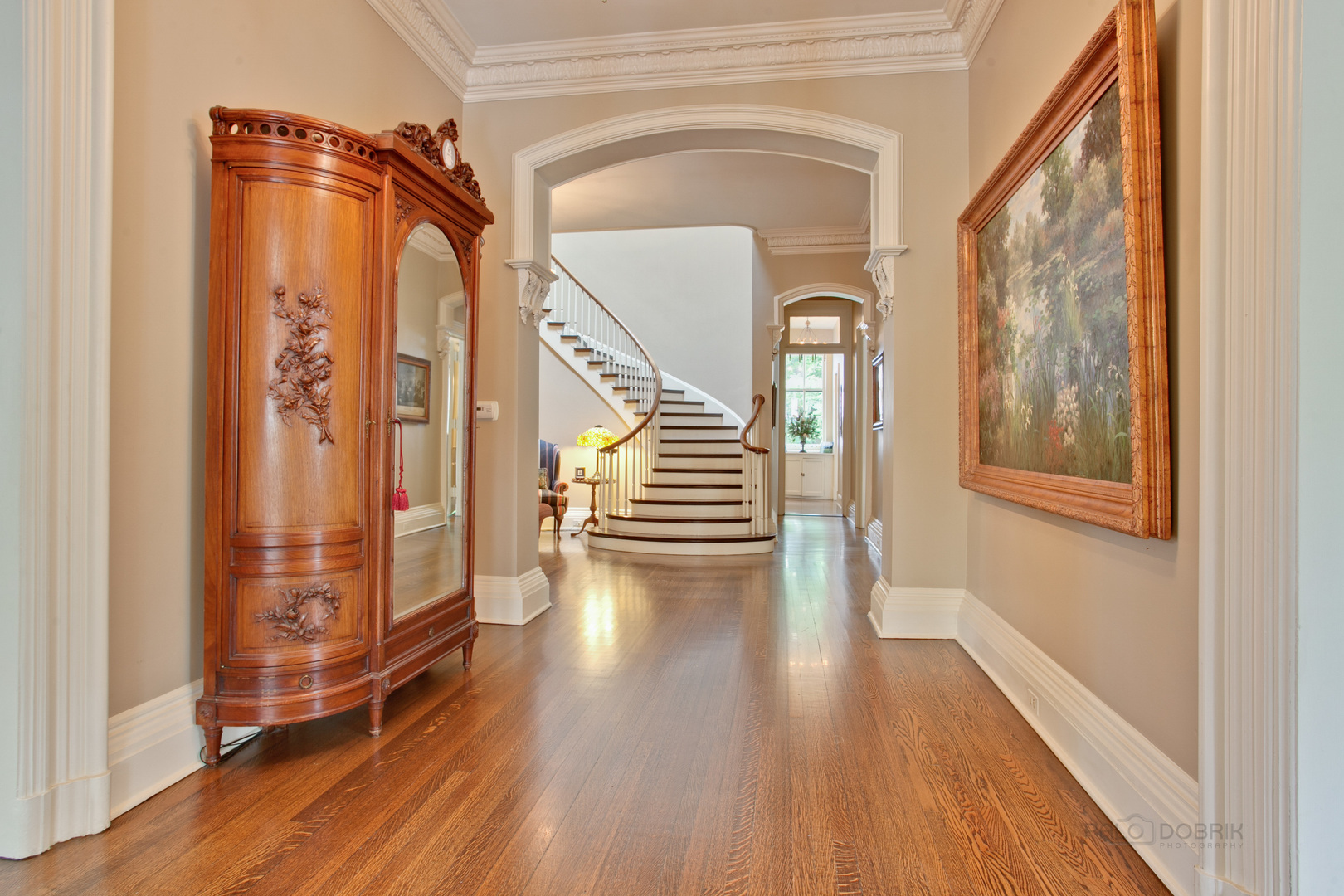 644 East Deerpath Road Lake Forest, IL 60045 - Photo 6 of 48 a view of a hallway with wooden floor and staircase