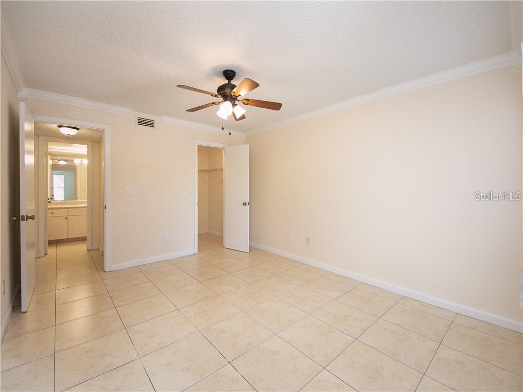 4606 Commander Drive, Unit 1124 Orlando, FL 32822 - Photo 8 of 16 a view of an empty room