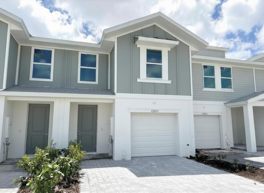 12941 Southwest Forli Way Port St. Lucie, FL 34987 - Photo 2 of 12 front view of a house