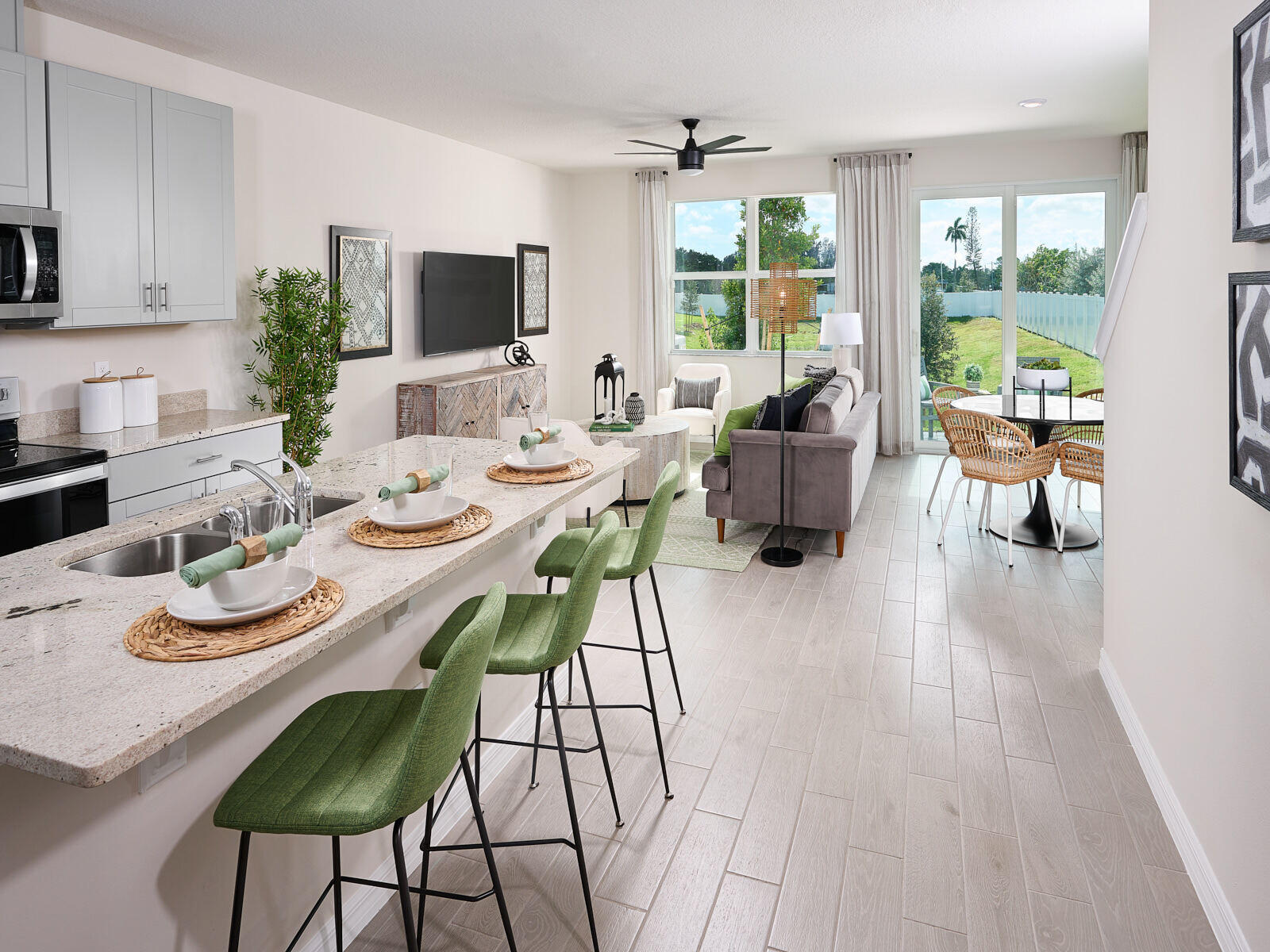 12941 Southwest Forli Way Port St. Lucie, FL 34987 - Photo 4 of 12 a view of a dining room with furniture window and outside view