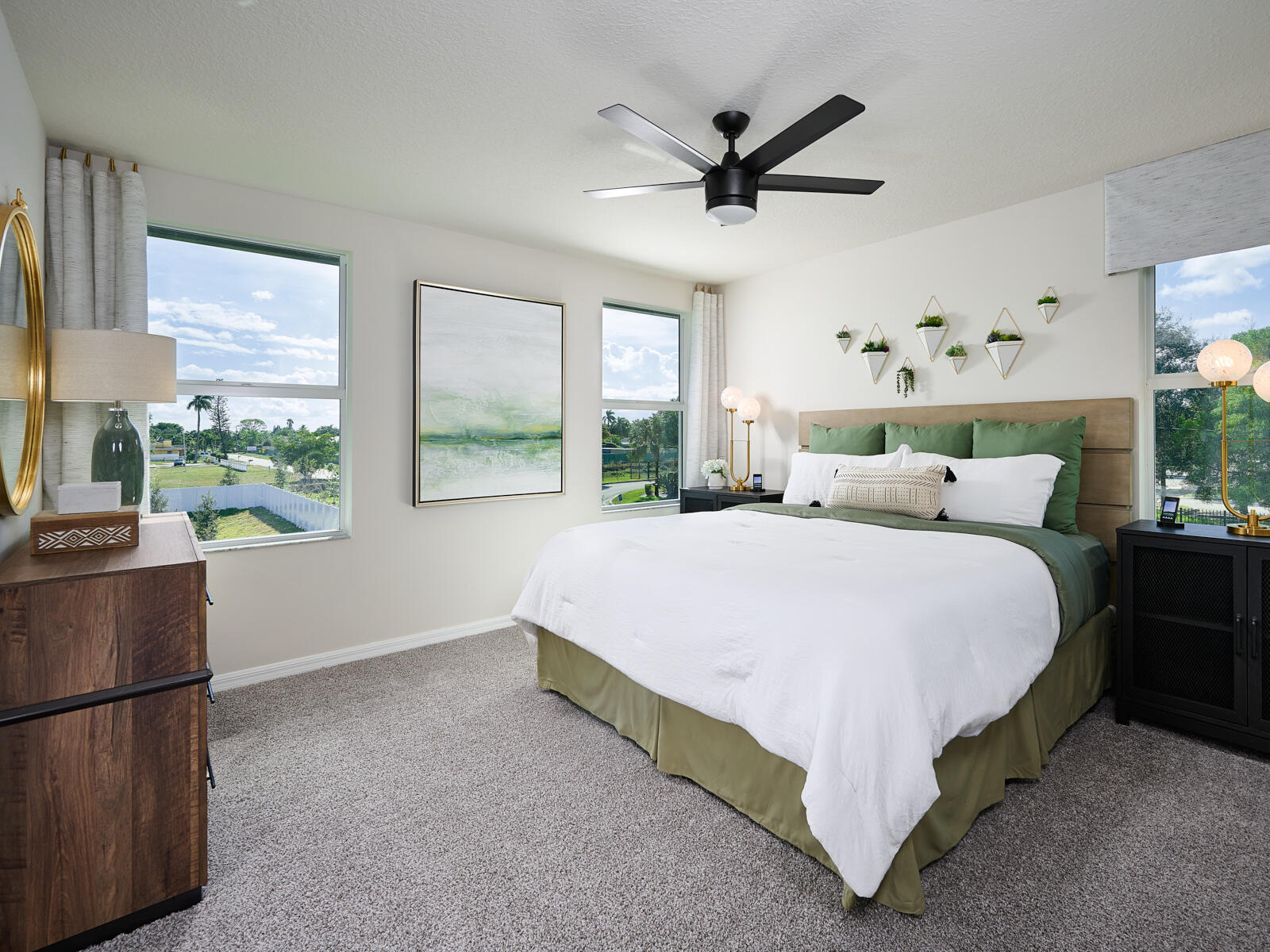 12941 Southwest Forli Way Port St. Lucie, FL 34987 - Photo 6 of 12 a bed room with a bed and a large window