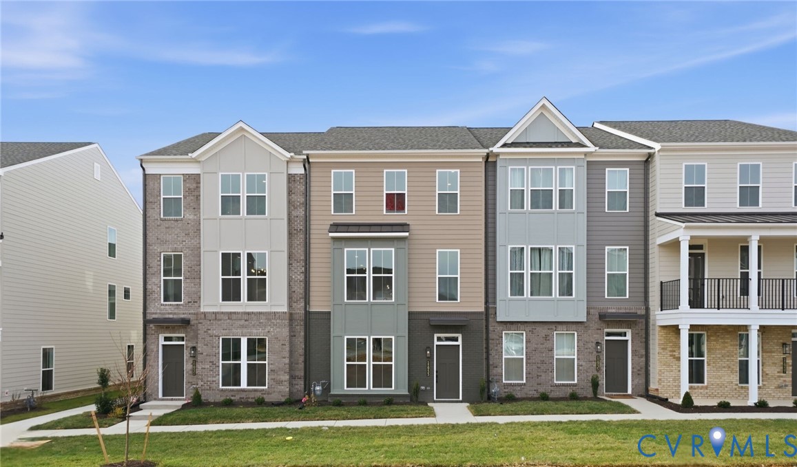 a front view of a building with yard