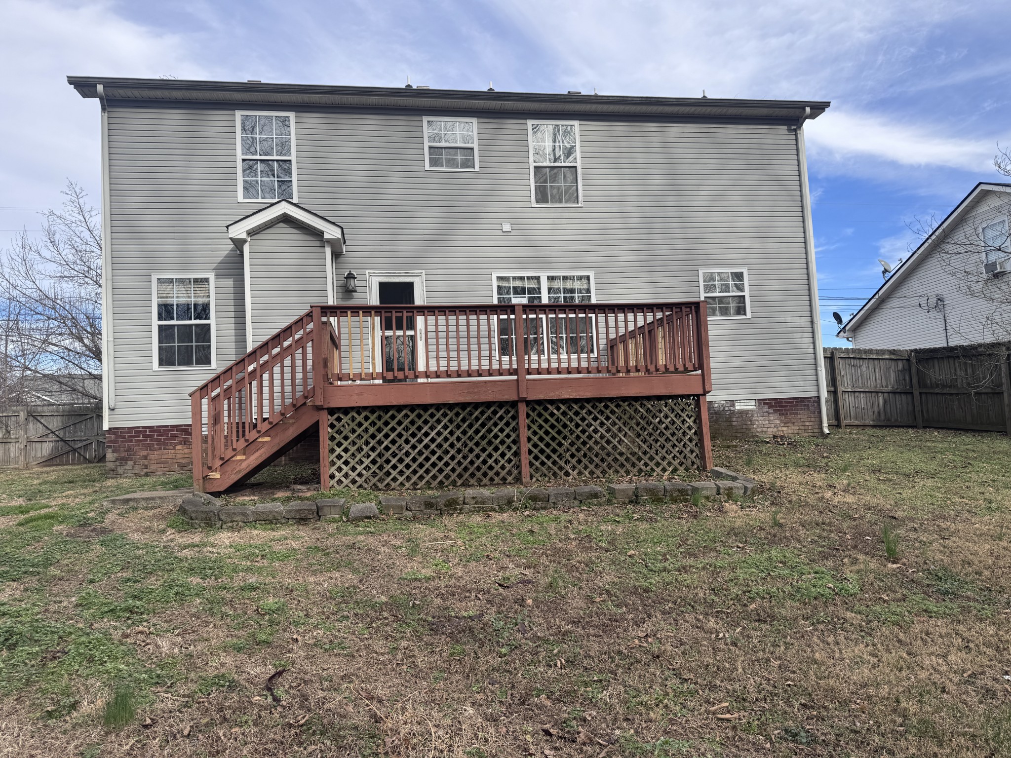 859 Sugarcane Way Clarksville, TN 37040 - Photo 13 of 13 a view of a house with a wooden deck