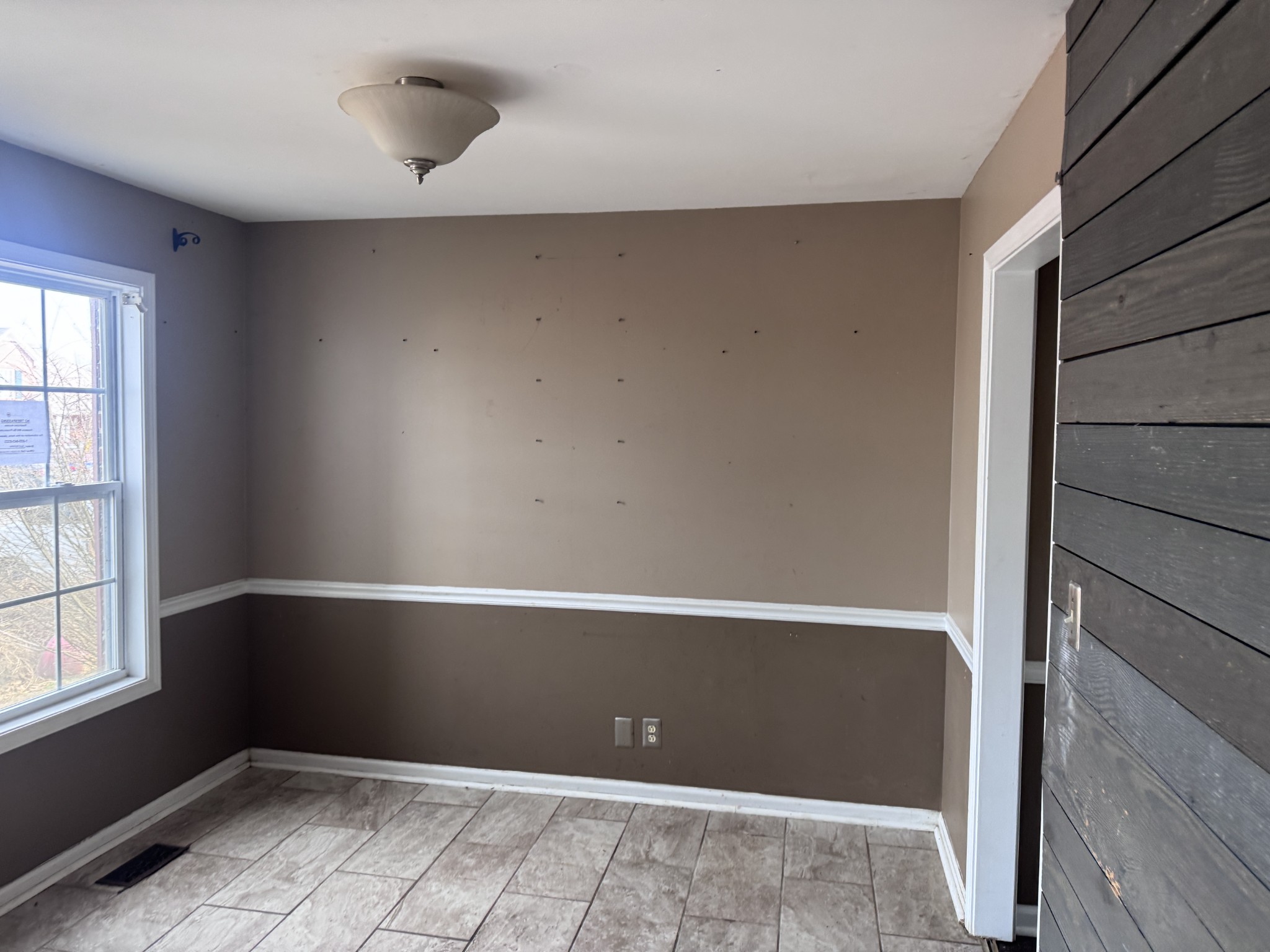 859 Sugarcane Way Clarksville, TN 37040 - Photo 4 of 13 a view of an empty room with a window