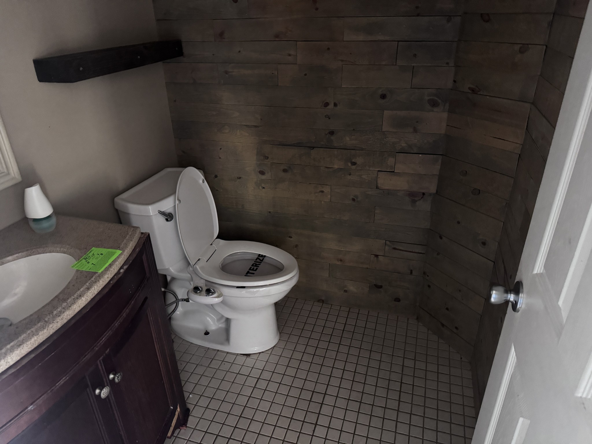 859 Sugarcane Way Clarksville, TN 37040 - Photo 5 of 13 a white toilet sitting next to a bathroom sink