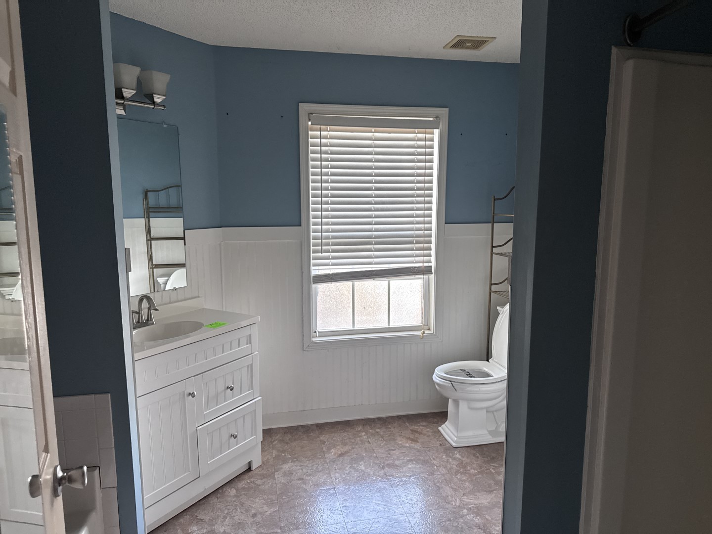 859 Sugarcane Way Clarksville, TN 37040 - Photo 7 of 13 a bathroom with a toilet sink and window