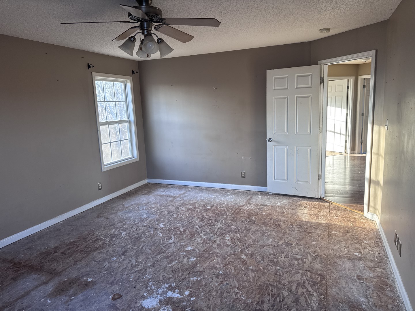 859 Sugarcane Way Clarksville, TN 37040 - Photo 8 of 13 an empty room with windows and fan