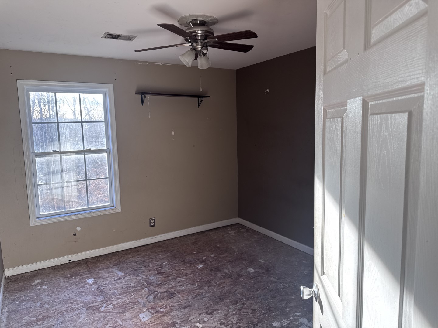 859 Sugarcane Way Clarksville, TN 37040 - Photo 10 of 13 a view of an empty room with a window