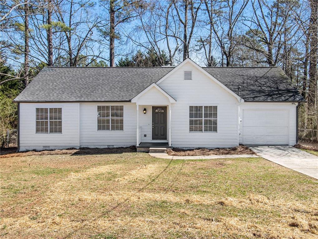 534 Oakview Drive Stockbridge, GA 30281 - Photo 1 of 1 a house with trees in the background