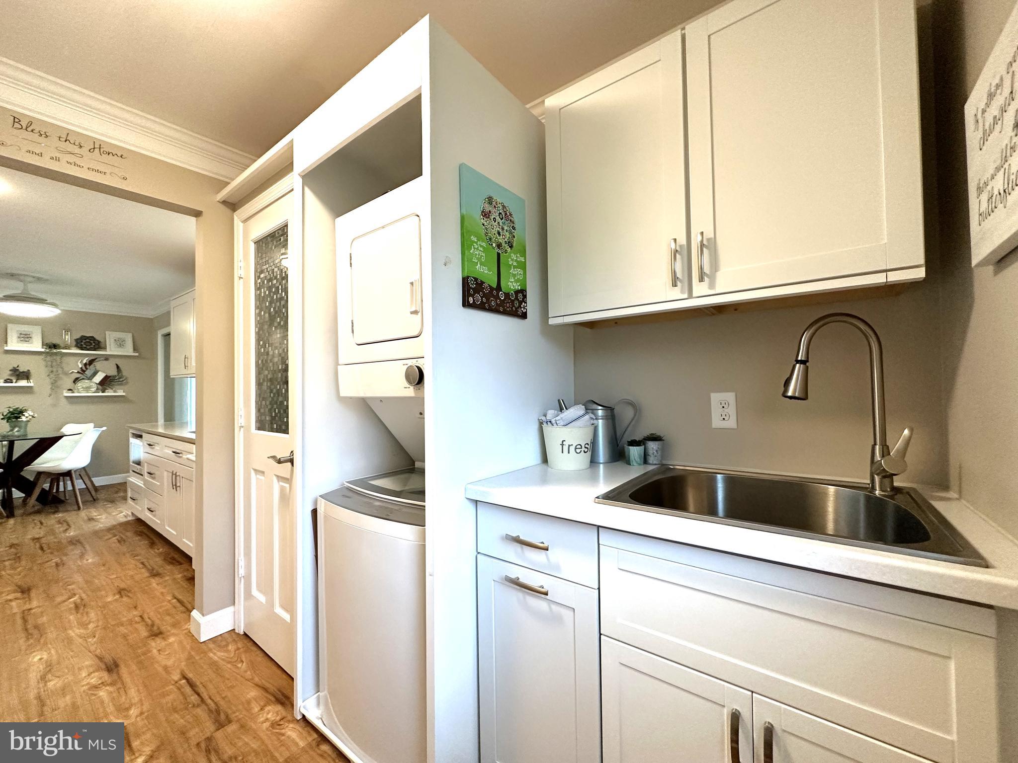 706 Central Avenue Ridgely, MD 21660 - Photo 11 of 22 Laundry room with garden sink