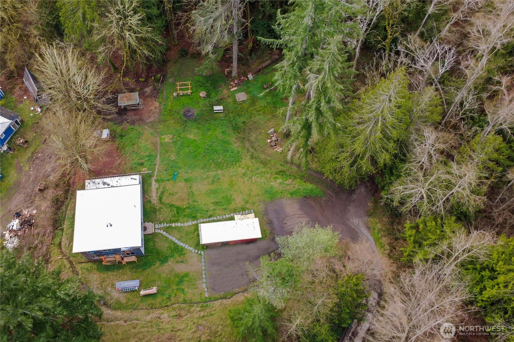 17410 68th Street Northwest Vaughn, WA 98394 - Photo 2 of 24 an aerial view of a house with a yard