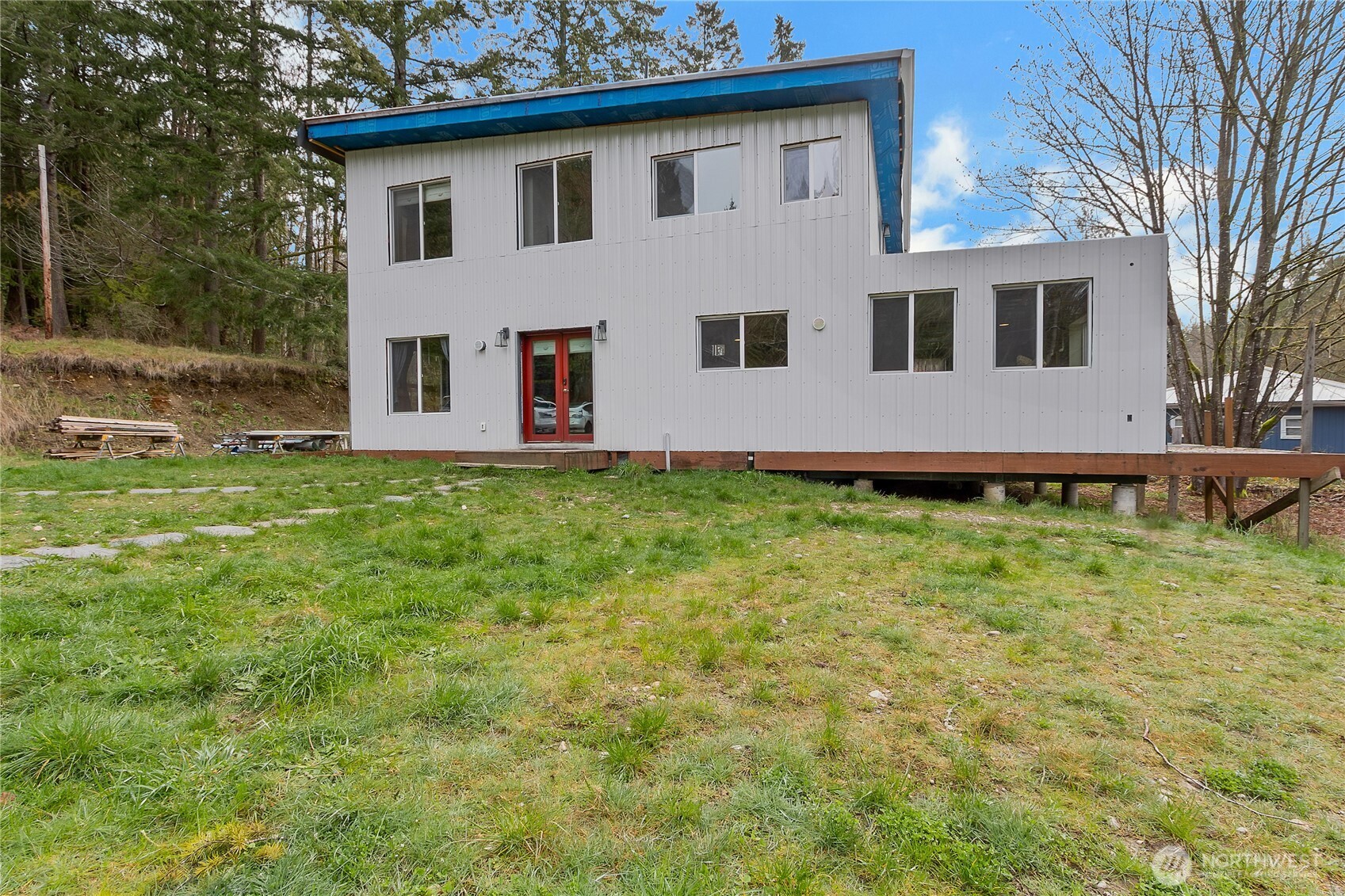 17410 68th Street Northwest Vaughn, WA 98394 - Photo 24 of 24 a view of a house with a yard