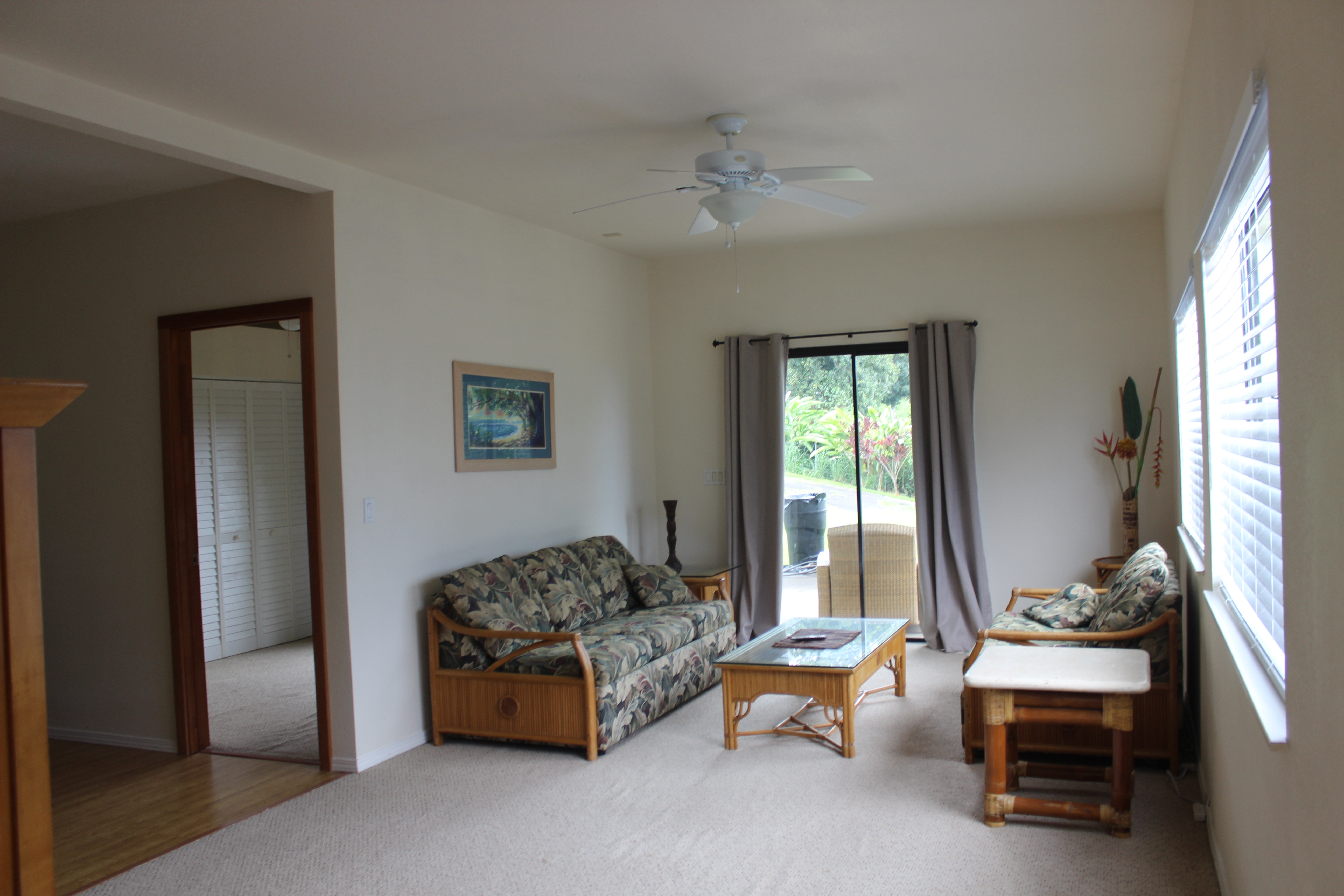 83-5477 Hawaiʻi Belt Road Captain Cook, HI 96704 - Photo 11 of 30 a bedroom with furniture and a window