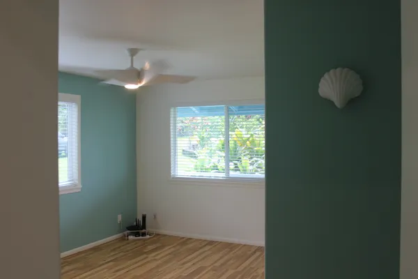 a view of a room that has a window in it