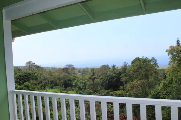 a view of a balcony with an outdoor space