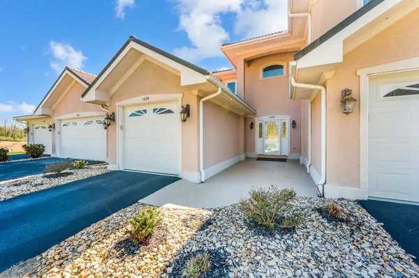a view of a houses with a big yard