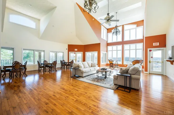 a room with gym equipment and large window