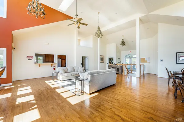 a front view of a multi story residential apartment building with a yard