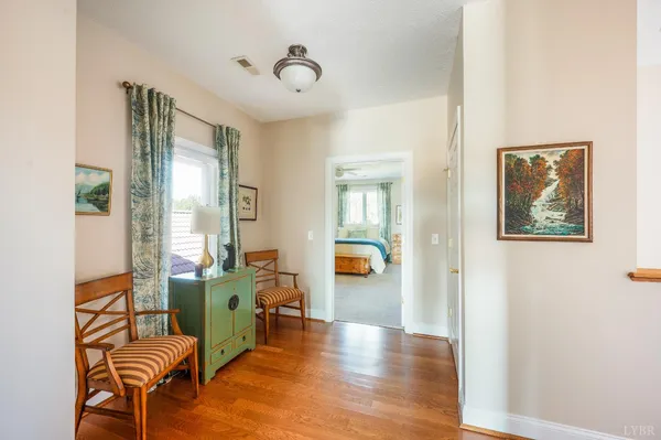 a view of a livingroom with furniture and windows