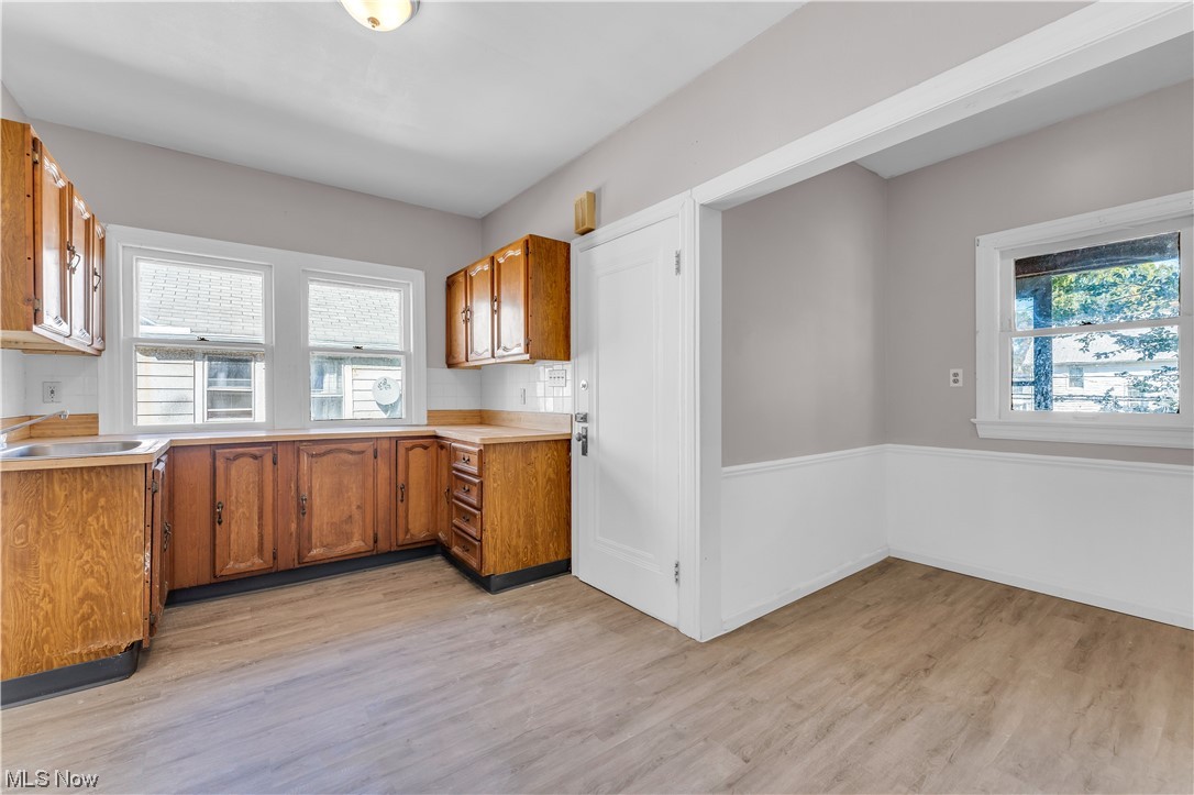 1499 Sherbrook Road South Euclid, OH 44121 - Photo 13 of 41 Kitchen with sink and light hardwood floors