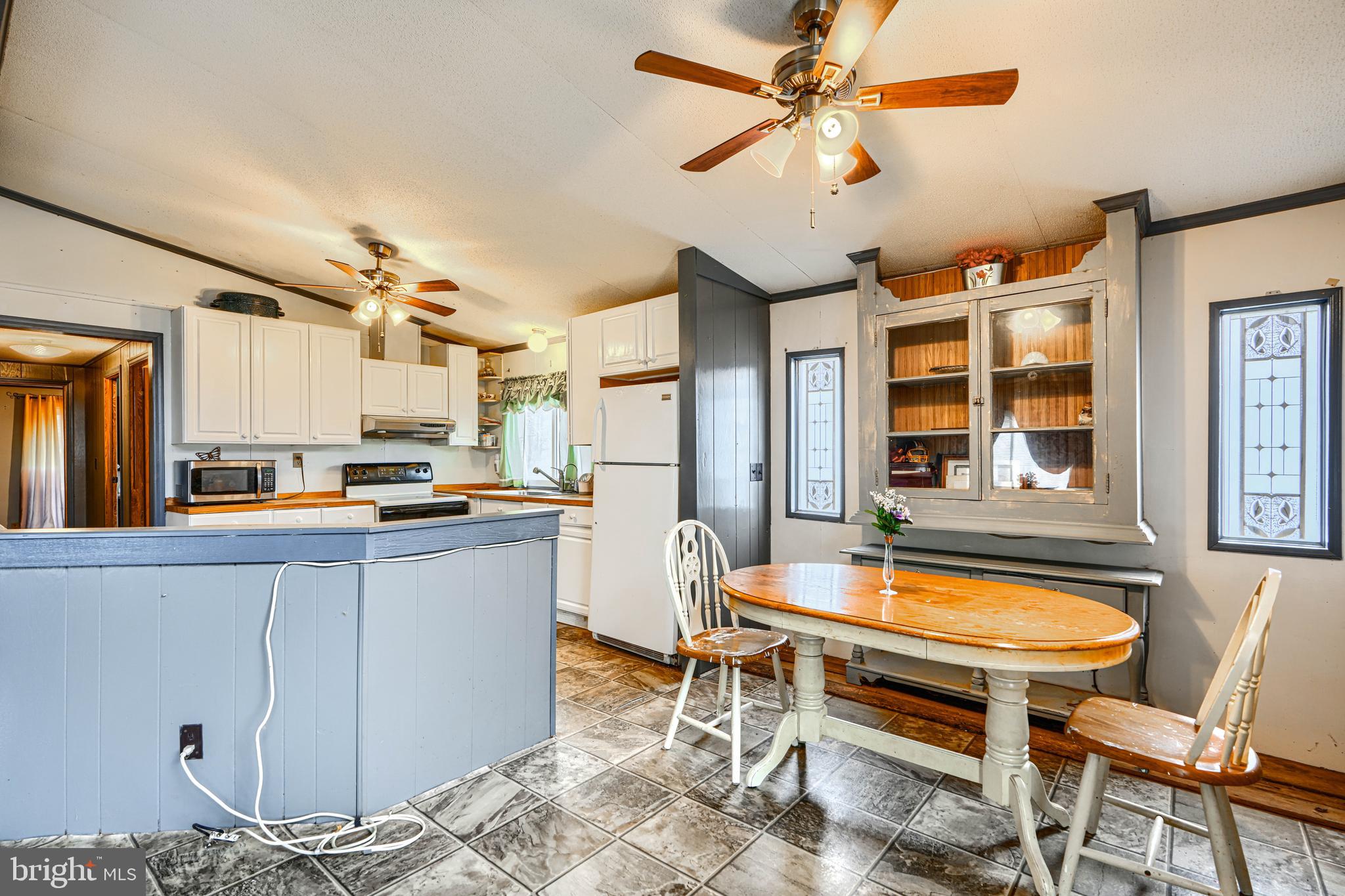 117 Rodeo Circle Middle River, MD 21220 - Photo 10 of 28 Dining Area w/Ceiling Fan