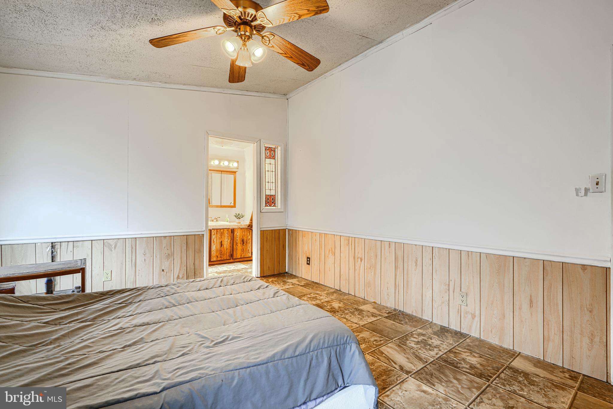 117 Rodeo Circle Middle River, MD 21220 - Photo 16 of 28 Primary Bedroom w/Ceiling Fan