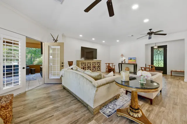 a living room with furniture and a table