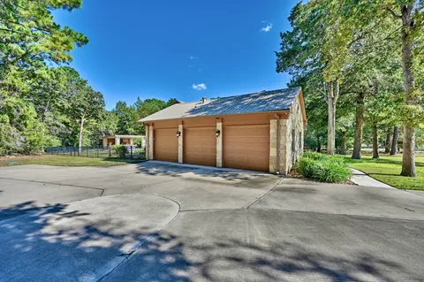 a view of a yard with swimming pool