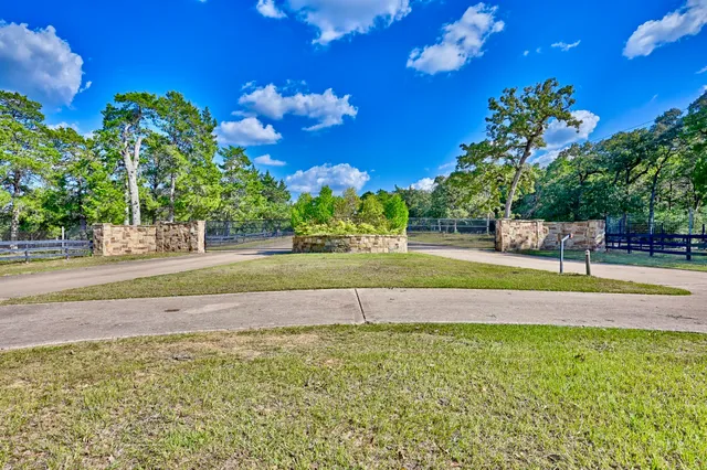 a view of a lake with a couple of people