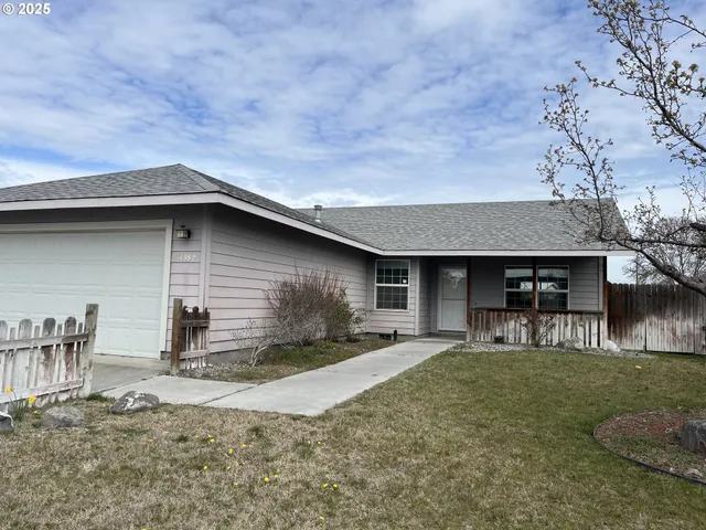 a house view with a outdoor space