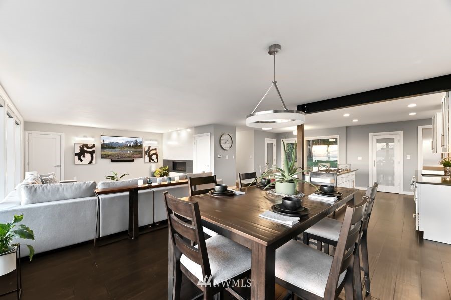 424 Fieldston Road Bellingham, WA 98225 - Photo 13 of 39 a view of a dining room with furniture window and wooden floor