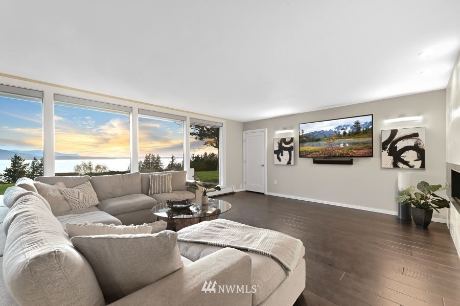 424 Fieldston Road Bellingham, WA 98225 - Photo 17 of 39 a living room with furniture and a large window